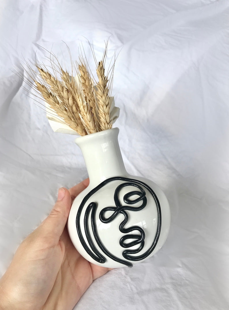 Black Face Vase