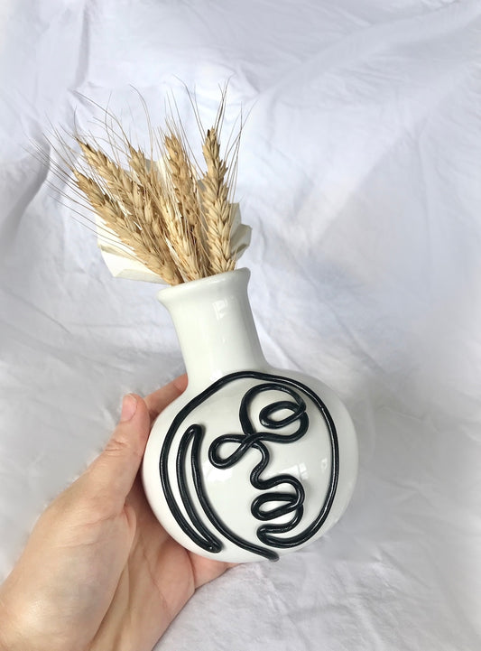 Black Face Vase
